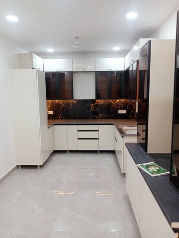 Kitchen in 4 BHK Builder Floor at Niti Khand – for Sale