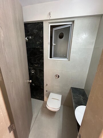 Bathroom in 1 BHK Apartment at Unique Ivana, Mira Road – for Sale