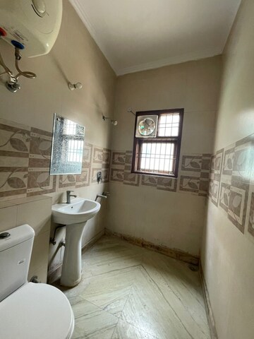 Bathroom in 4 BHK Builder Floor at Green Fields Colony – for Sale