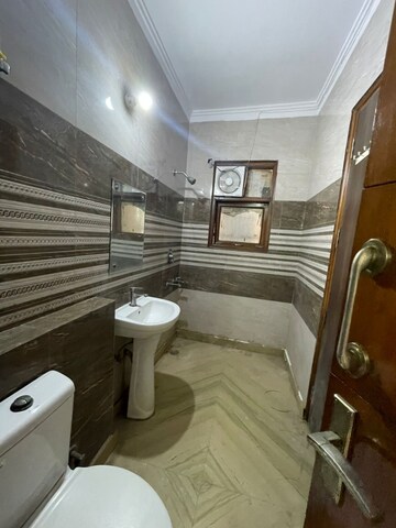Bathroom in 4 BHK Builder Floor at Green Fields Colony – for Sale