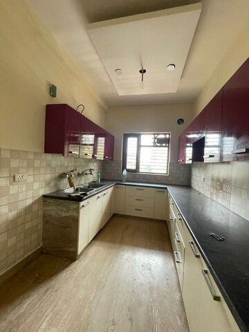 Kitchen in 4 BHK Builder Floor at Green Fields Colony – for Sale