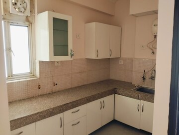 Kitchen in 2 BHK Apartment at Supertech Eco Suites, Sector 137 – for Sale