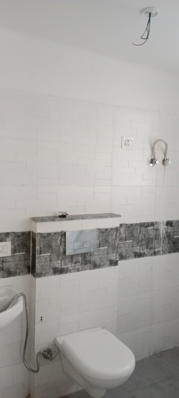 Bathroom in 3 BHK Apartment at Krish Icon, Alwar Bypass Road – for Sale