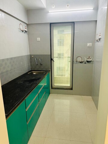 Kitchen in 1 BHK Apartment at Lodha Crown Taloja Quality Homes, Dombivli East – for Sale