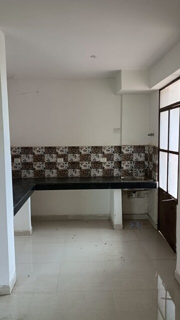 Kitchen in 2 BHK Apartment at Signature Global Synera, Sector 81 – for Sale