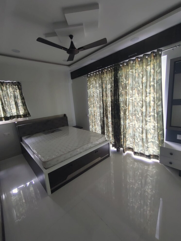 Living Room, atul-western-hills-phase-2 1.5 Bedroom 830 Sq.Ft. Apartment In Baner Pune 7559386