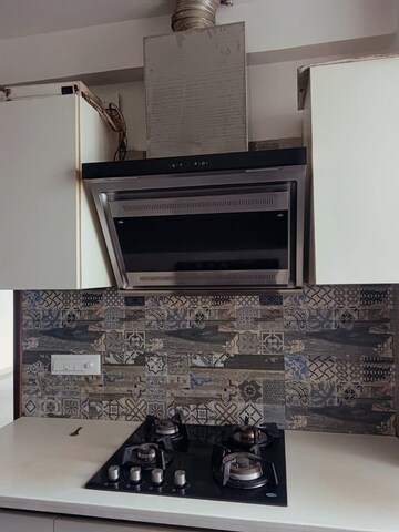 Kitchen in 4 BHK Builder Floor at Nirvana Country Birch Court, Sector 50 – for Sale