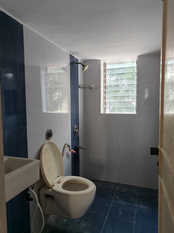 Bathroom in 2 BHK Apartment at Oakland Park, Andheri West – for Sale