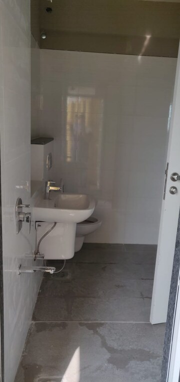 Bathroom in 2 BHK Apartment at Rustomjee Urbania Aurelia, Majiwada – for Sale