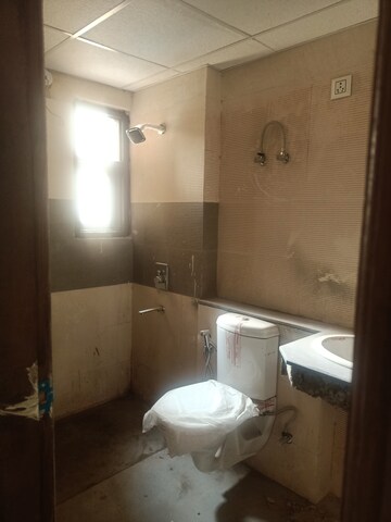 Bathroom in 2 BHK Apartment at Cosmos Express 99, Sector 99 – for Sale