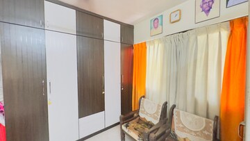 Living Room in 2 BHK Apartment at Naupada – for Sale