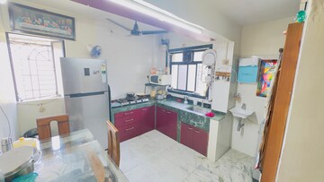 Kitchen in 2 BHK Apartment at Naupada – for Sale