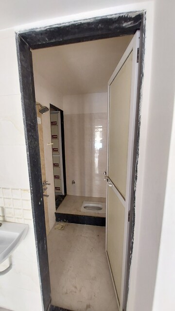 Bathroom in 1 BHK Apartment at Radhe Krishna Residency Khardipada, Khardipada – for Sale