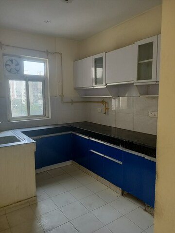Kitchen in 3.5 BHK Apartment at Jal Vihar Welfare Society, Sector 77 – for Sale
