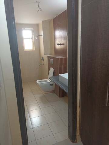 Bathroom in 3.5 BHK Apartment at Jal Vihar Welfare Society, Sector 77 – for Sale
