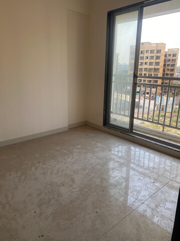 Living Room in 1 BHK Apartment at Unique Nirmal Nagari, Khardipada – for Sale