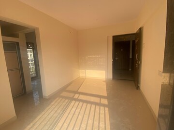 Living Room in 1 BHK Apartment at Unique Nirmal Nagari, Khardipada – for Sale