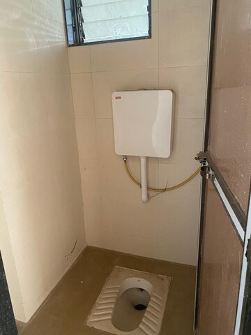 Bathroom in 1 BHK Apartment at Unique Nirmal Nagari, Khardipada – for Sale