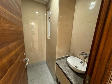 Bathroom in 2 BHK Builder Floor at Chattarpur – for Sale