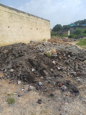Plot Area in  Plot at Bhopani Village – for Sale