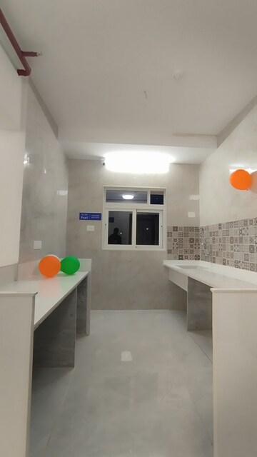 Kitchen in 1 BHK Apartment at Triveni Pearl, Khadakpada – for Sale