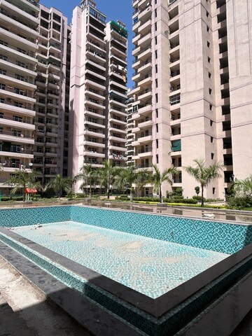 Swimming Pool in 3.5 BHK Apartment at JKG Palm Court, Sector 16c Greater Noida – for Sale