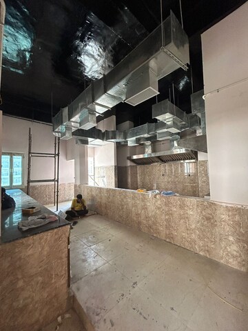 Kitchen in 3.5 BHK Apartment at JKG Palm Court, Sector 16c Greater Noida – for Sale