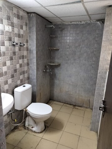 Bathroom in 3 BHK Apartment at Gardenia Golf City, Sector 75 – for Sale