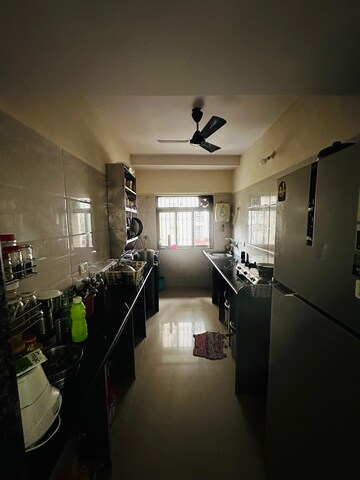 Kitchen in 3 BHK Apartment at Murbad Road – for Sale