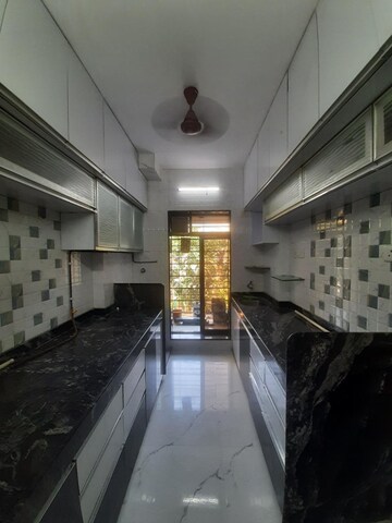Kitchen in 3 BHK Apartment at Omkar Alta Monte, Malad East – for Sale