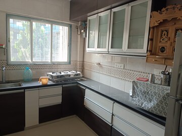 Kitchen in 3 BHK Apartment at Bhatia Dahisar Sumati CHS, Dahisar West – for Sale