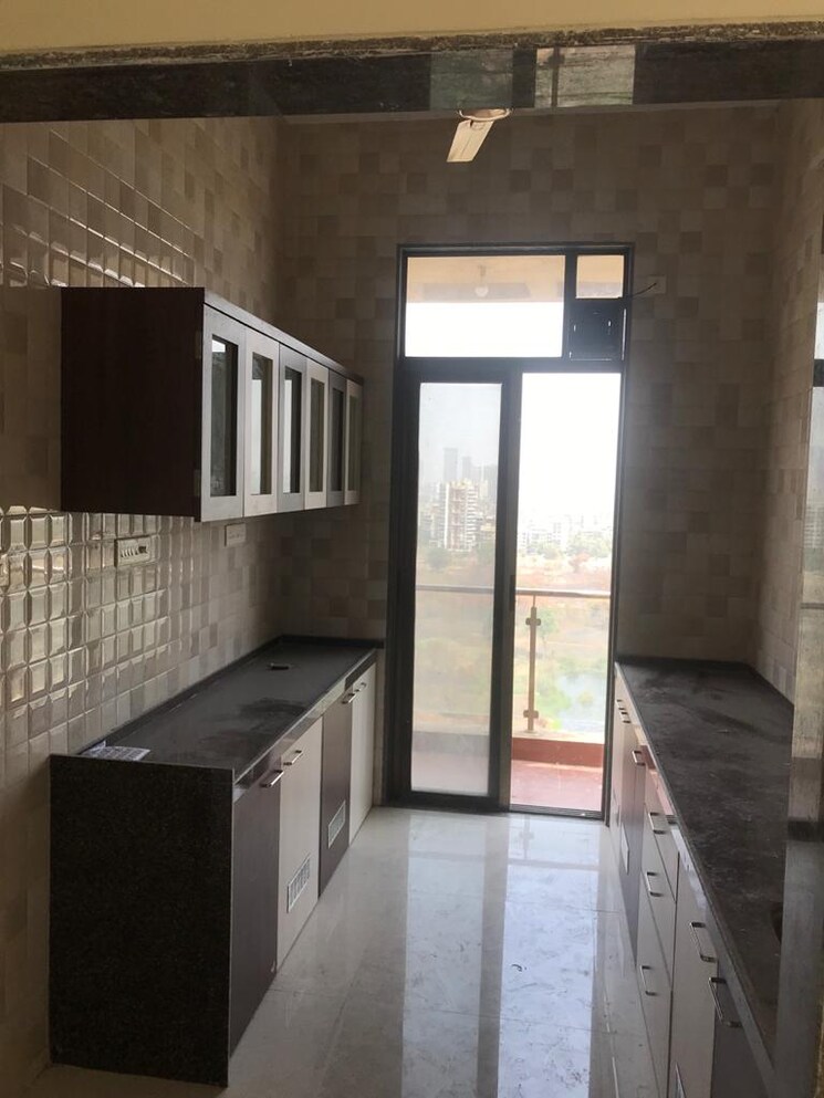 Kitchen, trishul-symphony 2 Bedroom 1400 Sq.Ft. Apartment In Kharghar Navi Mumbai 7568347