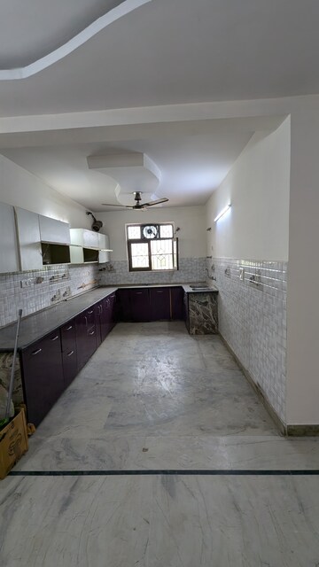 Kitchen in 4 BHK Builder Floor at Green Fields Colony – for Sale