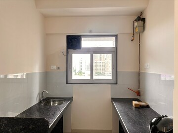 Kitchen in 1 BHK Apartment at Ashar Axis, Majiwada – for Rent