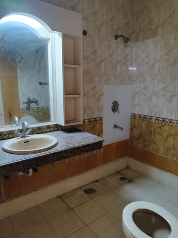 Bathroom in 3.5 BHK Builder Floor at Sarvodya Enclave – for Sale