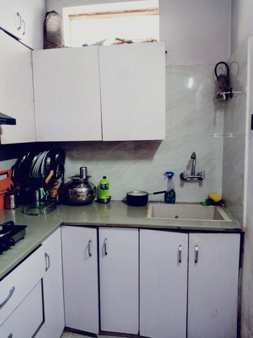 Kitchen in 3 BHK Builder Floor at Green Fields Colony – for Sale
