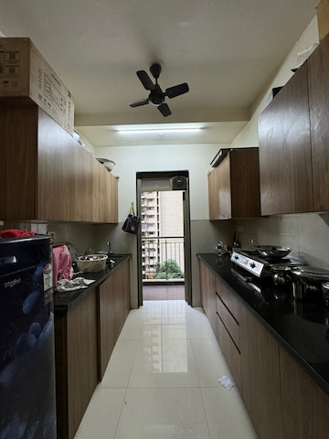 Kitchen in 2 BHK Apartment at Lodha Splendora Platino, Ghodbunder Road – for Sale