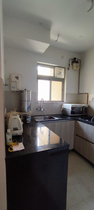 Kitchen in 2 BHK Apartment at Hiranandani Cardinal, Ghodbunder Road – for Sale
