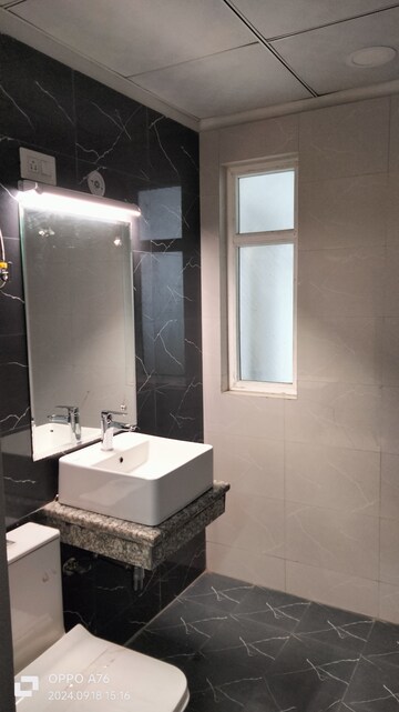 Bathroom in 2 BHK Apartment at SCC Blossom, Raj Nagar Extension – for Sale
