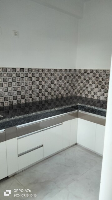 Kitchen in 2 BHK Apartment at SCC Blossom, Raj Nagar Extension – for Sale