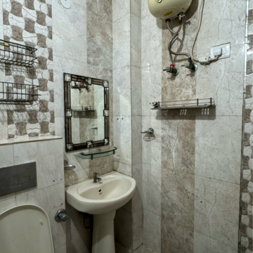 Bathroom in 3 BHK Builder Floor at Mohan Garden – for Sale