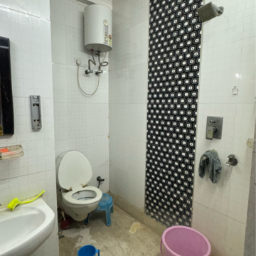 Bathroom in 3 BHK Builder Floor at Mohan Garden – for Sale