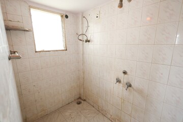 Bathroom in 1 BHK Apartment at Brahmand CHS, Brahmand – for Sale