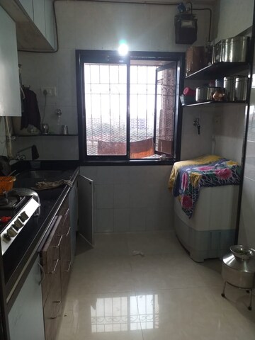 Kitchen in 1 BHK Apartment at Morya Avenue, Borivali East – for Sale