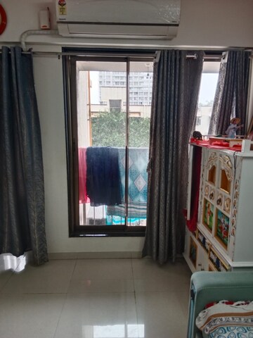 Bedroom in 1 BHK Apartment at Chandak Nishchay Wing F, Dahisar East – for Sale