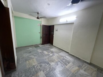 Living Room in 1 BHK Apartment at Uphar CHS Borivali, Borivali East – for Sale