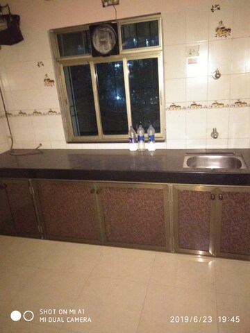 Kitchen in 1 BHK Apartment at Raj Sundaram, Dahisar East – for Sale
