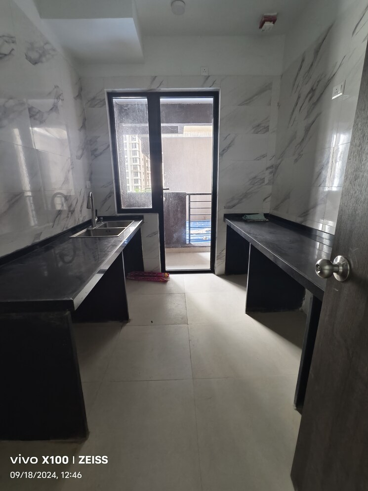 Kitchen, risland-the-icon-phase-2 2 Bedroom 671 Sq.Ft. Apartment In Dhokali Thane 7575802