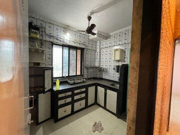 Kitchen in 1 BHK Apartment at Shree Suryodaya CHS, Dahisar East – for Sale