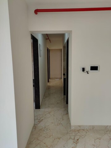 Building Lobby in 1 BHK Apartment at Tharwani Vedant Millenia, Titwala – for Sale